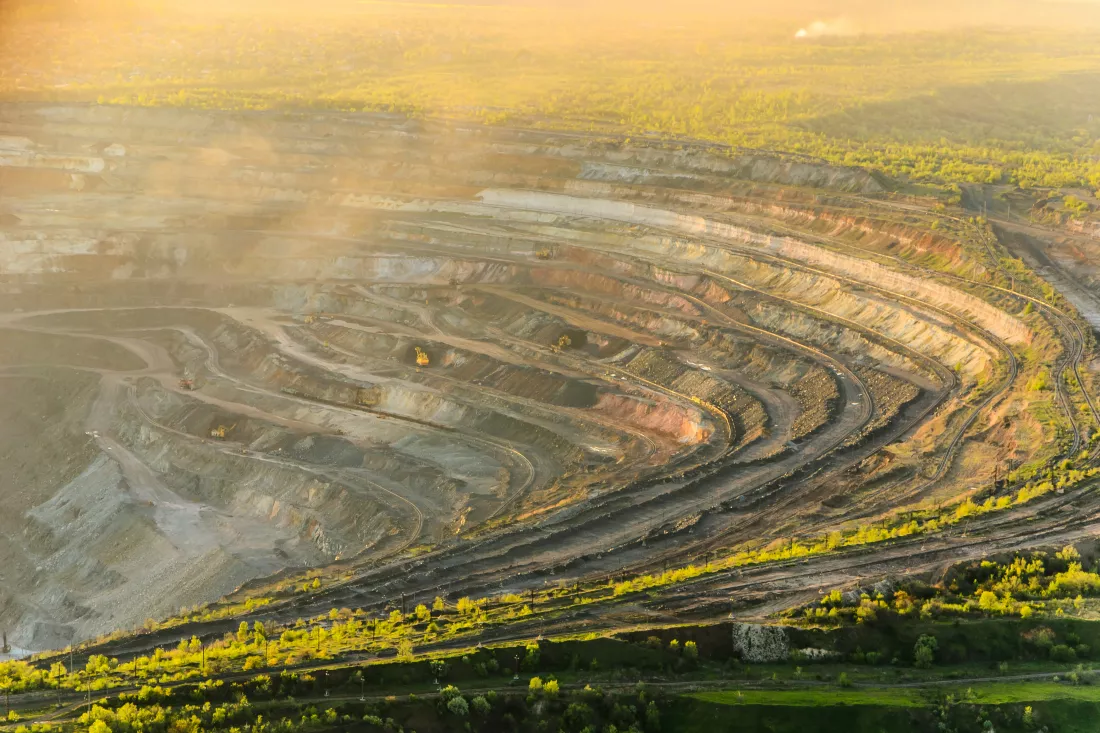 aerial-shot-huge-open-pit-sunset